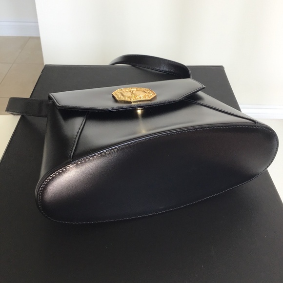 YSL Black Leather Handbag with YSL gold tone logo in the front - Picture 6 of 12